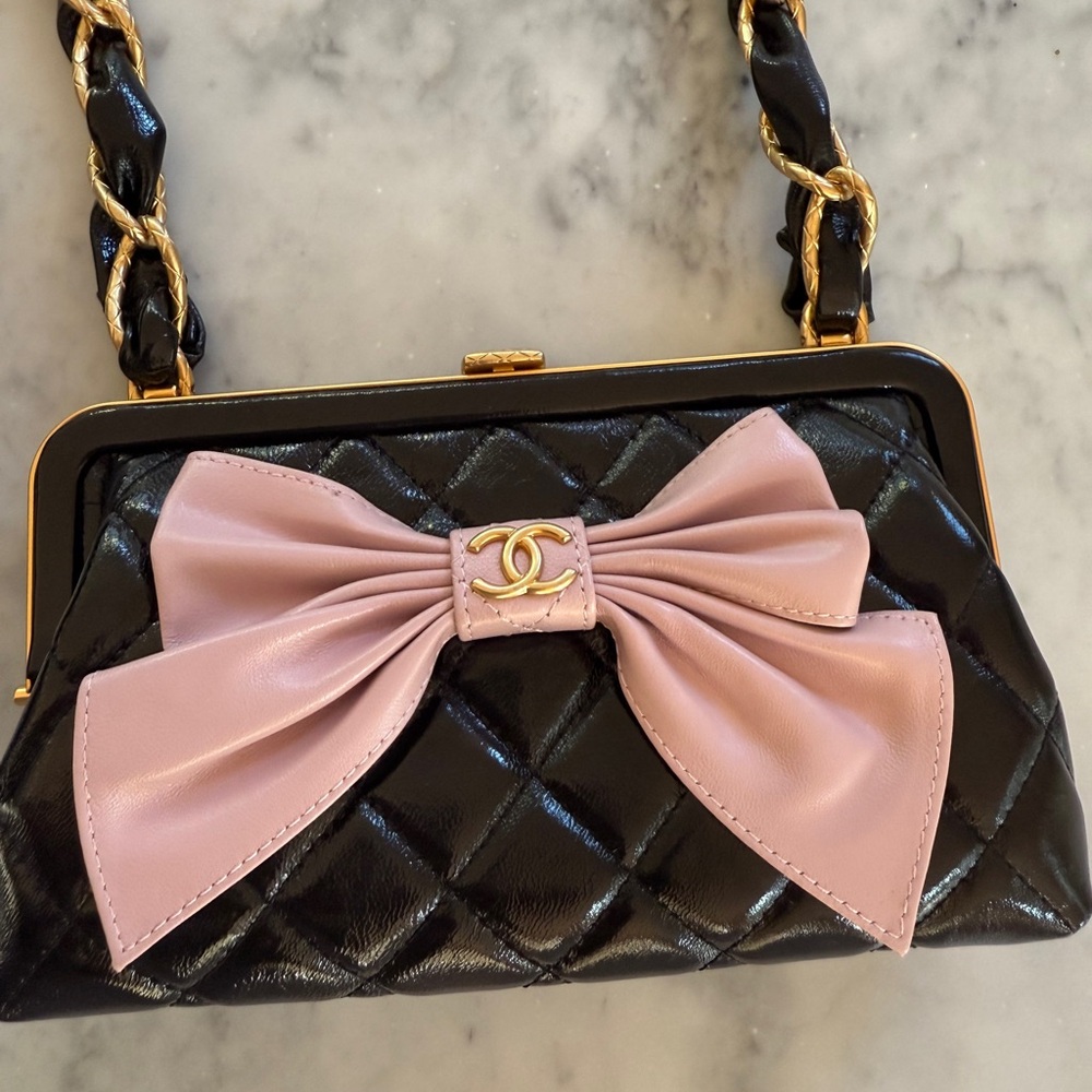 Chic Black and Pink Quilted Handbag.